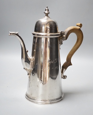 A 1970's 18th century style silver coffee pot, Bryan Savage, London, 1973, 24.5cm, gross 25oz.